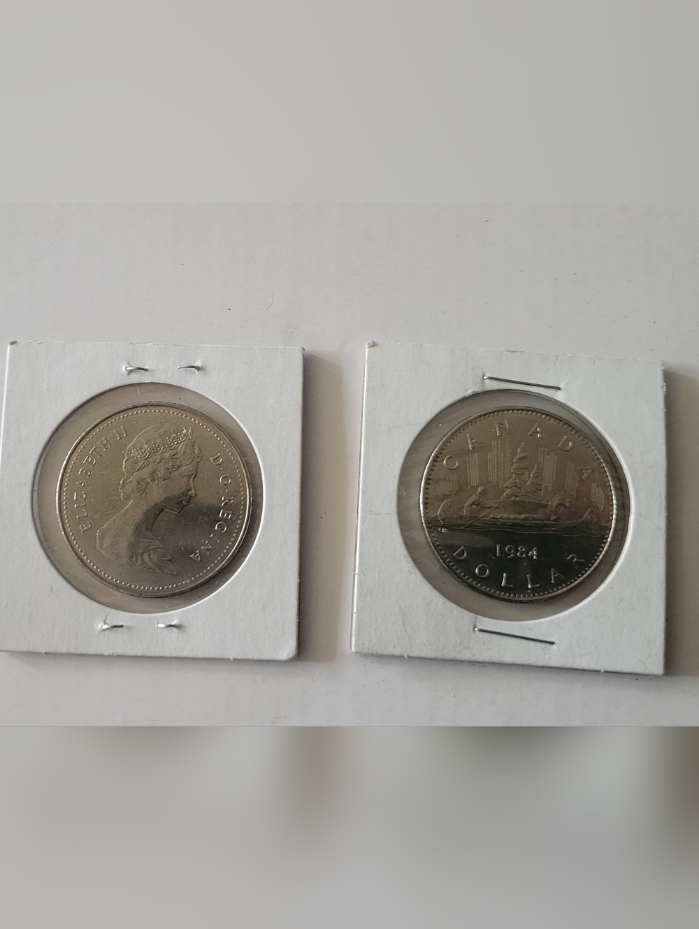 2-1984 Canadian "Voyageur" Dollar, featuring a canoe design on the reverse